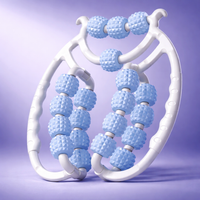 Blue and white massage tool on a purple background