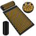 Zenithral acupressure mat and pillow set for muscle relief and deep relaxation, shown with massage and red light therapy equipment.